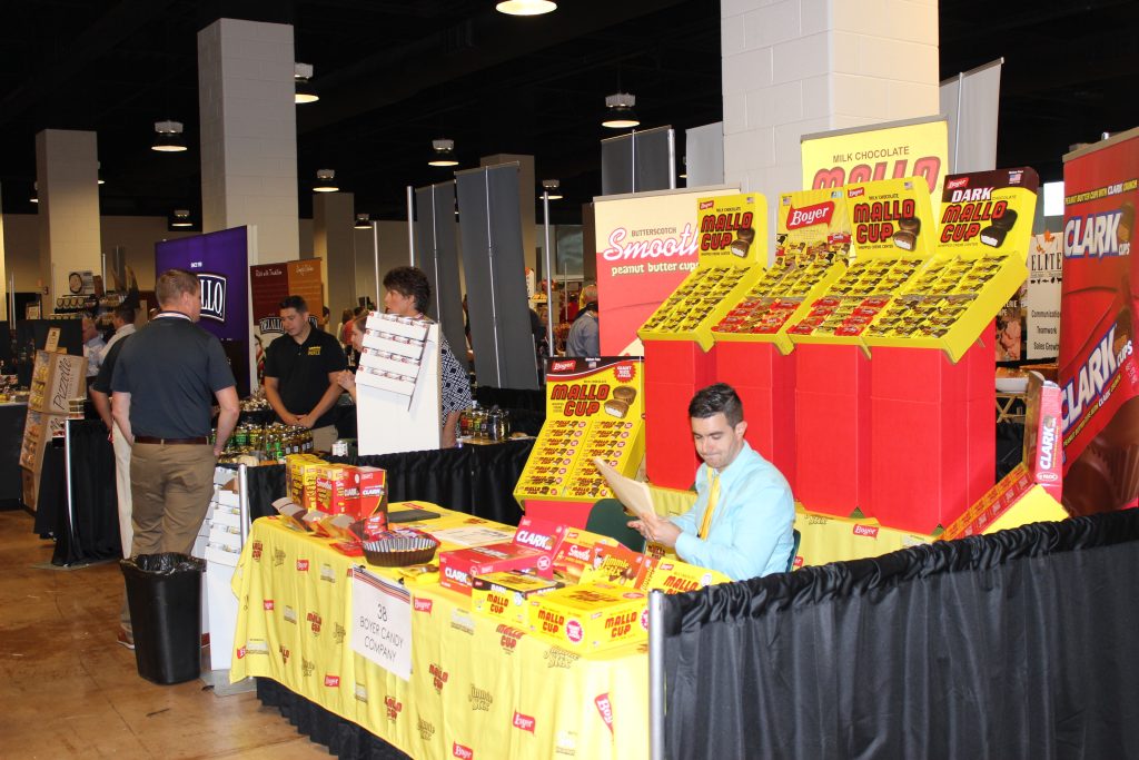 vendors at food table at trade show