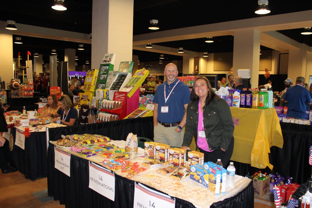 vendors at food table at trade show