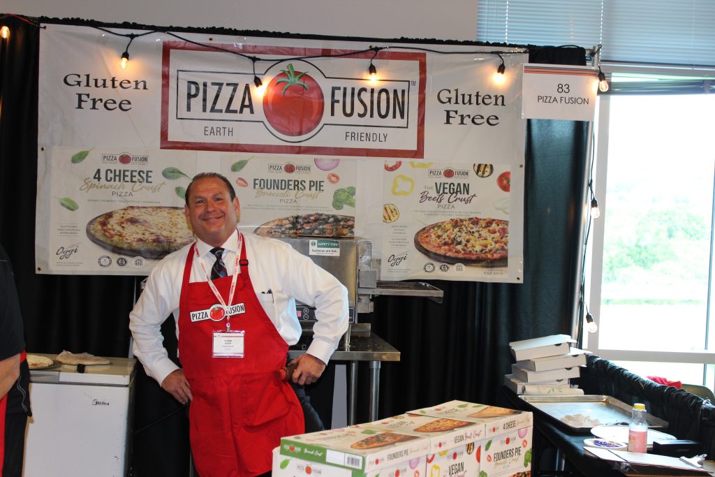 vendor from pizza fusion at the trade show